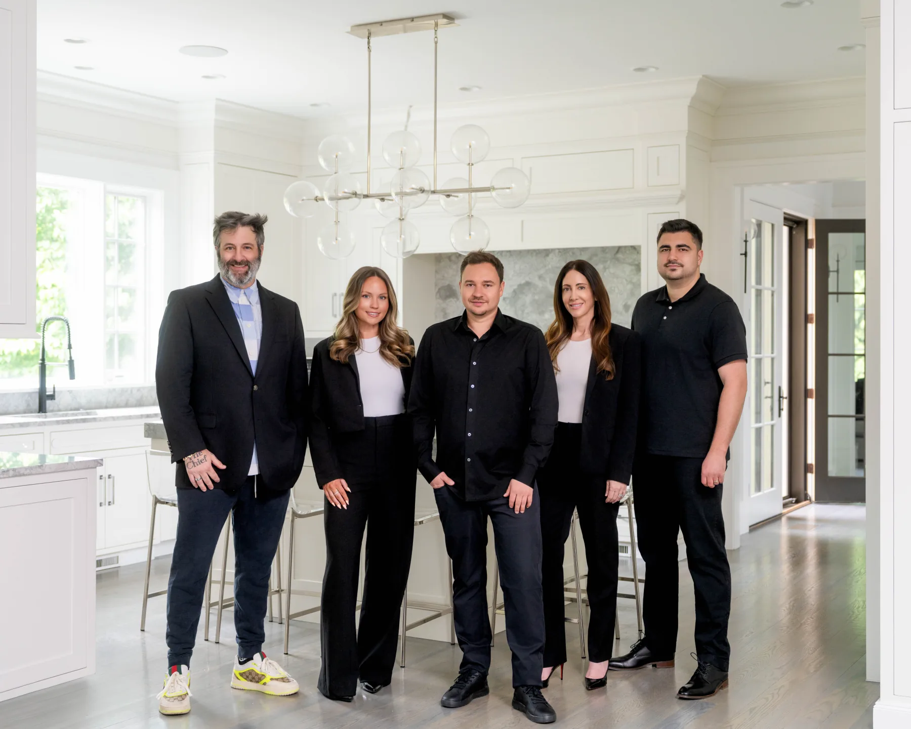 Craig Brody, Ashlie Tucker, Steven Novak, Melissa Muken, and Valvel Temin of the BMN Boston team